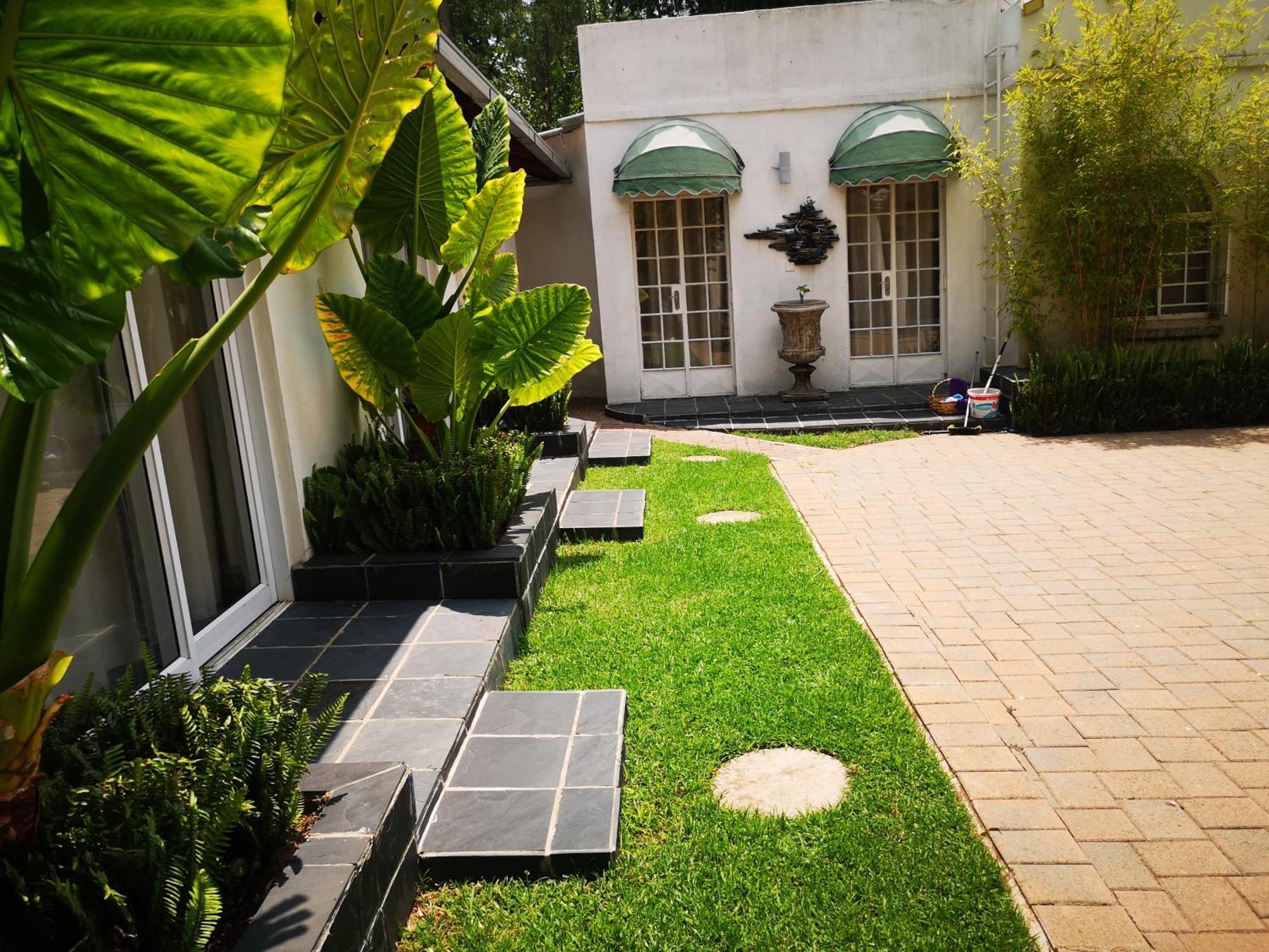 Lotus Guest House ヨハネスブルグ エクステリア 写真
