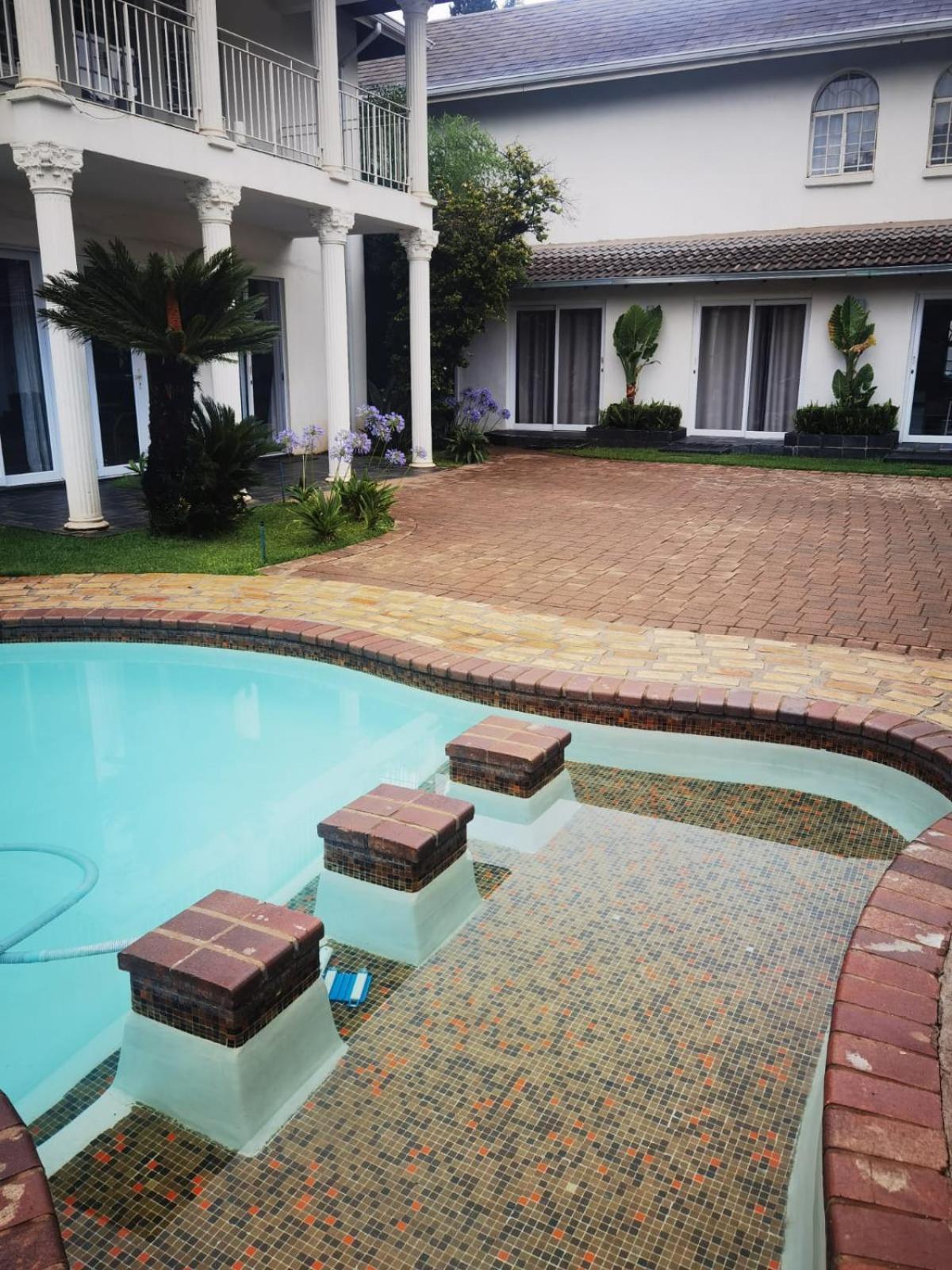 Lotus Guest House ヨハネスブルグ エクステリア 写真